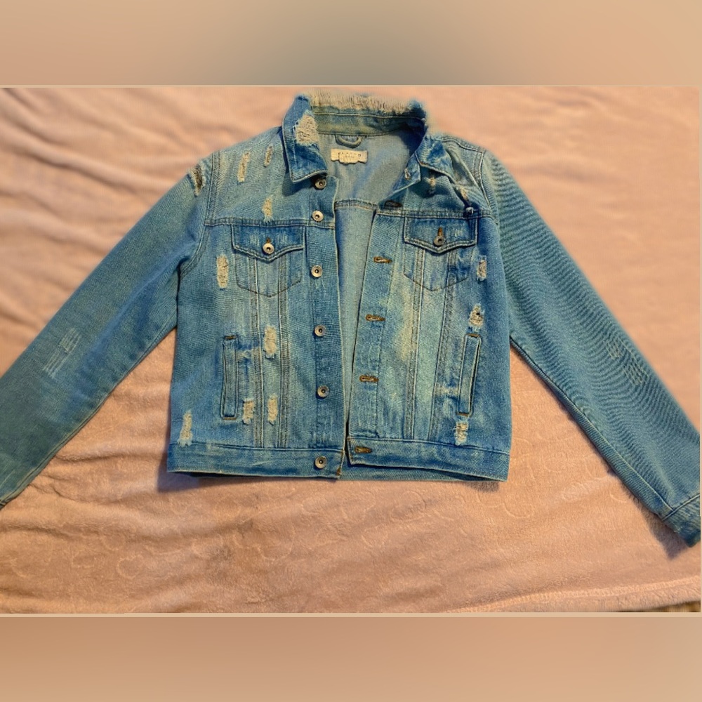 It’s a Jean jacket, sizes medium